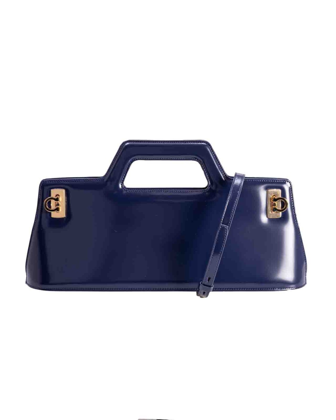 shop SALVATORE FERRAGAMO  Borsa: Salvatore Ferragamo borsa a mano Wanda East-West.
Forme geometriche, con quadranti rigidi che ospitano la sagomatura del manico e sono fissati con duplice fibbia Gancini laterale. 
L'interno è foderato on tone e completato da doppia tasca piatta. Da indossare a mano o a spalla grazie alla tracollina rimovibile.
Dimensioni: altezza 20.0 CM lunghezza 37.0 CM profondità 9.0 CM.
Composizione: 100% pelle di vitello.
Fabbricato in Italia.. 213484 766579-017 number 2219138